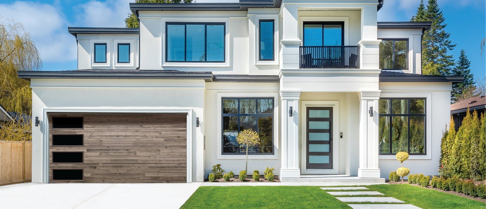 Classic Steel Garage Doors, Model 8300A, Beachwood Wood Grain Finish, Verticial Clear IV Windows Classic Steel Models 8300 – 8500 Gallery, OTT Garage Doors